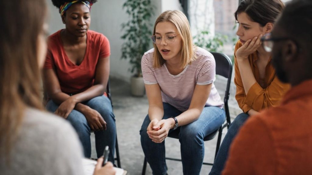 Group therapy session at a women's trauma treatment center