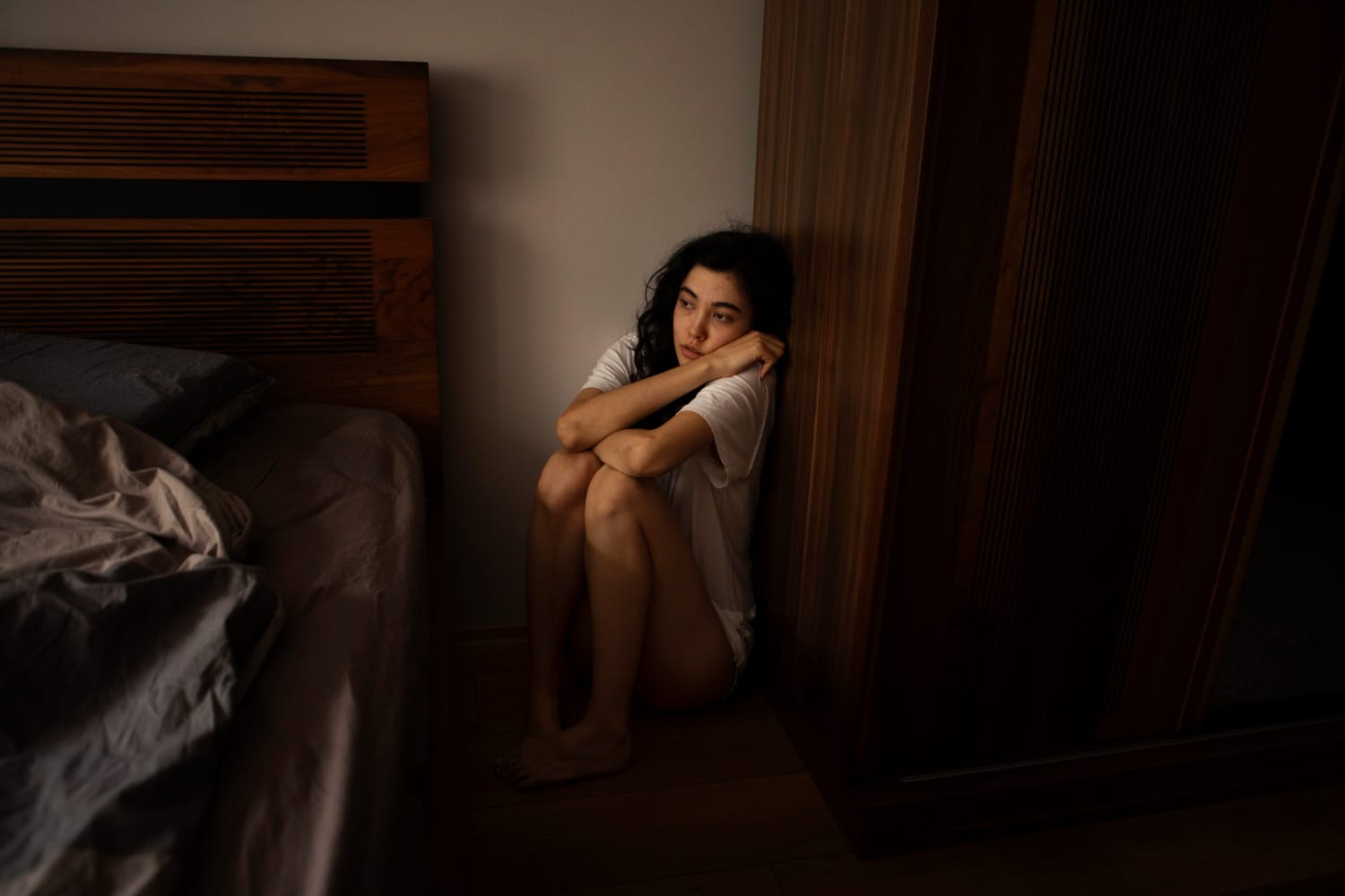 Woman looking terrified, symbolizing the internal struggle of depression