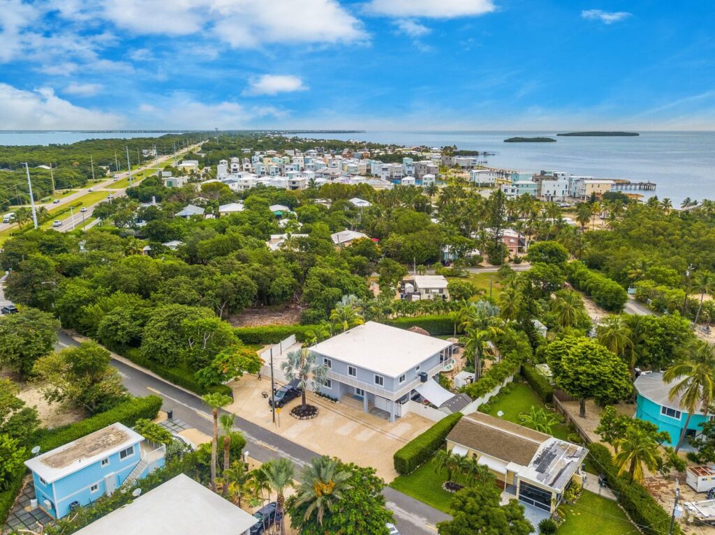 Aerial view of Kinder in the Keys near ocean and roadway