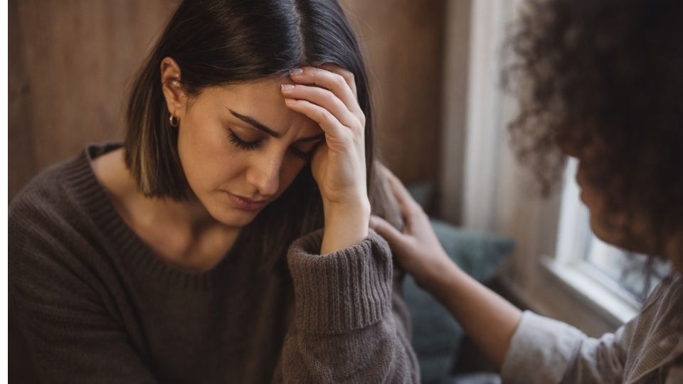 

Depression is one of the most common mental health conditions in the world, affecting nearly 7% of U.S. adults each year and more than 16% at some point in their lifetime. The causes of this condition are widely misunderstood; it develops from a complex mix of biological, personal, and environmental forces rather than any single source. Treatment is available, and most people improve significantly with proper care and support.

Quick Takeaways





Depression is a medical condition, not a weakness, affecting millions of Americans every year



Causes of depression include neurochemical disruptions, inherited factors, major life events, and personal factors



Depression symptoms must persist for at least two weeks to meet diagnostic criteria

What Is Depression?

Depression is one of the most prevalent mood disorders worldwide, characterized by a persistent feeling of sadness, hopelessness, and a loss of interest in activities once enjoyed. According to the American Psychiatric Association, the condition is far more serious than ordinary sadness, and it significantly disrupts how a person thinks, feels, and functions.

[IMAGE PLACEMENT: Person sitting alone looking downward near a window | alt: "person experiencing depression sitting alone by a window reflecting sadness"]

More than 16% of U.S. adults will experience depression at some point in their lives, according to the Centers for Disease Control. The condition can affect people at any age. Children and teenagers often display irritability and a sad mood rather than obvious sadness, while older adults may show more subtle signs of clinical depression. The American Psychiatric Association notes that a diagnosis requires symptoms to persist for at least two weeks and significantly impair daily functioning.

Depression is a genuine medical condition, not a character flaw. People cannot simply choose to feel better. The condition may feel isolating, but it responds well to treatment, and most people who seek help experience meaningful improvement.

What Causes Depression?

What causes depression is rarely one single thing. Personal factors, chronic stress, and significant life events all interact to determine whether someone develops the condition. No single biological marker or experience causes depression universally, and research suggests that the threshold for a depressive episode is lowered when multiple vulnerabilities combine over time.

Causes Depression: The Role of Biology

Biology is central to understanding the development of depression. Structural differences in the brain, disrupted neurotransmitter activity, and altered emotional processing all contribute to depressive disorders. These biological patterns interact with psychological factors in how a person processes stress, and together they shape overall risk.

Research suggests that depression may begin at the cellular level, where changes in nerve cells and their signaling pathways affect mood, motivation, and energy. When chronic adversity causes depression to emerge, it is often through its sustained impact on these biological systems and their ability to regulate emotion.

Chemical Imbalance and Brain Chemistry

A chemical imbalance is one of the most recognized explanations for why depression develops. Neurotransmitters, including serotonin, dopamine, and norepinephrine, regulate mood and emotional responses. When these brain chemicals fall out of balance, nerve cells lose their ability to communicate mood signals effectively, and the condition can take hold.

This is why antidepressant medications, particularly selective serotonin reuptake inhibitors, are commonly prescribed. These medications work by restoring serotonin availability and correcting the chemical imbalance that underlies many cases of depression. When left untreated, this neurochemical disruption can trigger a major depressive episode with symptoms severe enough to disrupt work, relationships, and daily life.

Genetic Vulnerability and Family History

Genetic vulnerability is one of the strongest and most consistent predictors of depression. Having blood relatives with major depressive disorder substantially increases a person's own likelihood of developing the condition. Genes that influence brain chemistry and the body's stress response can be inherited, creating a biological predisposition to mood disruption.

A family history of depression does not guarantee the condition will develop. Instead, it lowers the biological threshold, meaning that significant life events or chronic adversity are more likely to bring on depression in a predisposed individual. Those aware of their genetic vulnerability can take proactive steps toward early intervention and prevention.

Health Conditions That Can Trigger Depression

Chronic Health Conditions and Chronic Pain

Several health conditions are strongly associated with depression, particularly those involving long-term physical strain. Chronic pain, cancer, heart disease, and diabetes all create sustained physical and emotional burdens that raise the likelihood of developing depression over time. Managing a serious medical condition day after day places significant demands on a person's mental and emotional resources.

The relationship between these conditions and depression runs in both directions. Depression worsens the experience of chronic pain and other illnesses, while those illnesses simultaneously raise depression risk. Treating both the physical medical condition and any co-occurring mood disorder together typically produces better outcomes.

Health Problems, Hormones, and Sleep

Specific conditions, including thyroid disorders, hormonal imbalances, and nutritional deficiencies, can directly mimic or intensify depressive symptoms. Blood tests are a standard part of any diagnostic workup because they allow a doctor to rule out these physical causes before confirming a mental health diagnosis.

Hormonal changes are a particularly significant contributor to depression. Postpartum depression affects many new mothers and is directly tied to the hormonal shifts following childbirth, making it distinct from typical postpartum fatigue. Similarly, hormonal fluctuations during menopause can trigger a depressive episode in some individuals.

Sleep problems also play a central role, functioning both as a symptom and as a deepening factor. Poor sleep disrupts neurochemical balance, reduces emotional resilience, and weakens the body's ability to manage stress, creating a reinforcing cycle that can sustain depression over weeks or months.

Life Events and Environmental Triggers

Major Life Events That Trigger Depression

Major life events are among the most common external triggers of depression. Loss of a loved one, divorce, job loss, financial hardship, or prolonged illness can all push vulnerable individuals into a depressive episode. Even positive but overwhelming changes, such as the birth of a child or a major career transition, can contribute to onset when stressful events accumulate faster than a person can process them.

These life events do not cause depression in isolation. They interact with genetic predisposition, personal history, and existing mental health issues to determine whether the condition develops. When social support is limited and multiple stressors compound, the risk rises considerably.

Personal Factors and Personality

Personal factors play a major role in how vulnerable someone is to depression. Low self esteem, self-criticism, and pessimism create an internal environment where negative thinking becomes self-reinforcing and recovery becomes harder. Certain personality traits, including perfectionism, predispose people to experience depression when they face failure or sustained adversity.

Rumination, the habit of dwelling on negative experiences repeatedly, perpetuates depressive cycles. Relationship difficulties strip away crucial emotional buffers, and low self esteem intensifies the impact of setbacks by making it harder to challenge negative self-perceptions. Together, these personal factors can significantly increase how likely someone is to develop depression when circumstances become challenging.

Drug and Alcohol Use

Drug and alcohol use is directly linked to depression through several mechanisms. Substances alter brain chemicals in ways that can trigger depression independently of any life circumstances. Many people begin using recreational drugs or alcohol to cope with emotional pain, not realizing that substance abuse actually deepens and prolongs the condition over time.

This relationship works in both directions. Depression makes substances more appealing as a temporary escape, while heavy alcohol and drug use worsens depressive symptoms and undermines the effectiveness of any treatment. Chemical disruptions caused by heavy use can persist even after a person stops, complicating recovery. A healthcare provider can help develop an integrated care plan that addresses both drug and alcohol use and the underlying mood disorder at the same time.

Depression Symptoms

Common Symptoms of Depression

Recognizing depression symptoms early is one of the most important steps toward getting appropriate care. The most common symptoms of depression include persistent sadness or emptiness, loss of interest or pleasure in activities once enjoyed, fatigue, appetite changes, sleep disruption, difficulty concentrating, and feelings of worthlessness or excessive guilt.

Other symptoms of depression include physical manifestations such as chronic pain, headaches, and digestive problems with no clear physical cause. How the condition presents varies by age; children and teenagers are more likely to show irritability and behavioral changes rather than obvious sadness, while older adults may display more subtle or atypical signs. According to the American Psychiatric Association, for a major depressive disorder diagnosis, symptoms of depression must persist for at least two weeks and significantly interfere with daily functioning.

Even mild depression warrants professional evaluation, since early intervention can prevent progression to more severe forms of the condition.

Severe Depression and Its Impact

Severe depression is the most disabling form of the condition and can make even basic daily functioning feel impossible. People experiencing severe depression often struggle to maintain employment, sustain relationships, or manage routine self-care without professional support.

Many who experience depression alongside other mental health challenges face a more complex path to recovery. Approximately 60% of comorbid conditions co-occurring with depression are anxiety disorders, including generalized anxiety, panic disorder, and social phobia. This combination creates a worse course and makes treatment more demanding, underscoring the importance of thorough evaluation and comprehensive care.

Types of Depressive Disorder

Several distinct types of depressive disorder exist, each differing in duration, severity, and the specific circumstances that lead to its onset. Understanding these distinctions helps clarify both diagnosis and the most appropriate treatment direction.

[IMAGE PLACEMENT: Visual chart comparing types of depression | alt: "infographic comparing major depressive disorder, persistent depressive disorder, bipolar, and postpartum types"]







Type of Depression



Duration



Key Features





Major Depressive Disorder



Episodes of 2+ weeks



Severe symptoms significantly impairing daily life





Persistent Depressive Disorder



2+ years



Chronic, less intense symptoms with ongoing quality-of-life impact





Bipolar



Varies by episode



Alternating episodes of low mood and mania or hypomania





Postpartum Depression



Weeks to months post-birth



Triggered by hormonal shifts; more serious than typical post-birth adjustment





Clinical Depression



Ongoing



Broad clinical term for any depressive condition requiring professional treatment

Major depressive disorder is the most severe form, requiring at least one episode lasting two weeks or longer with symptoms that significantly impair functioning. Persistent depressive disorder is a chronic condition lasting at least two years; it is less intense but persistently disruptive to quality of life.

Bipolar disorder involves cycling between depressive and manic or hypomanic episodes, with the depressive phase closely resembling major depression clinically. Postpartum depression is distinct from typical post-birth fatigue and is directly linked to the hormonal changes and life stressors that accompany childbirth. Clinical depression is the broad umbrella term used for any depressive disorder serious enough to require professional treatment.

Risk Factors for Depression

Certain risk factors consistently increase the likelihood of developing depression. Understanding these helps enable earlier intervention and more targeted prevention.

Key contributors to depression include:





Family history of depression or other mental health conditions



Genetic vulnerability related to neurochemical regulation and the stress response



Chronic health conditions or serious illness



Major life stressors, including loss, trauma, or financial hardship



Drug and alcohol use or a history of substance abuse



Low self esteem, perfectionism, or pessimistic thinking patterns



Limited social connections and community support



Childhood adversity, including physical or sexual abuse or neglect



Hormonal changes linked to pregnancy, childbirth, or menopause



Co-occurring mental health conditions such as anxiety disorders

Childhood adversity is among the most enduring contributors to depression. Research from the National Institute of Mental Health indicates that early trauma fundamentally changes how the brain processes and responds to stress, creating lasting vulnerability to mental disorders throughout adulthood.

Healthcare Provider: When to Seek Help

When to See a Healthcare Provider

Knowing when to contact a healthcare provider is critical. If depression symptoms persist for two weeks or longer and begin interfering with work, relationships, or daily functioning, it is time to act. It is always better to seek treatment sooner rather than later; waiting for early symptoms to worsen leads to worse outcomes and longer recovery times.

A healthcare provider will typically begin with blood tests to rule out physical causes such as thyroid dysfunction or nutritional deficiencies, then complete a thorough mental health evaluation. They can provide an accurate diagnosis and develop a tailored treatment plan or refer you to a mental health professional who specializes in depressive disorder treatment.

Mental Health Treatment Options

Effective treatment for depression is available, and most people who experience depression see meaningful improvement with the right approach. The most effective plans typically combine several strategies tailored to the severity and individual circumstances.

Talk therapy, particularly cognitive behavioral therapy, is one of the most well-supported psychological treatment options for depression. It helps people identify and change unhelpful thought patterns, build coping skills, and break cycles of rumination. Other useful approaches include interpersonal therapy, group therapy, and psychodynamic therapy.

Medications that correct these neurochemical imbalances are a cornerstone of care for moderate to severe depression. A psychiatrist or doctor can determine the appropriate type and dose based on the type and severity of the condition.

Beyond formal clinical care, lifestyle factors matter. Regular physical activity, a healthy diet, and consistent sleep all strengthen emotional resilience. Research suggests that sustained exercise can be as effective as medication for mild depression. Connecting with a faith community or supportive group also provides the social grounding that helps counter the isolation that commonly deepens depression.

How to Prevent Depression

Steps to Prevent Depression

While it is not always possible to prevent depression entirely, evidence-based strategies can substantially reduce risk and delay onset. Understanding your personal factors and individual vulnerabilities allows for a more proactive approach to mental health.

Steps that can lower your risk include:





Building and maintaining strong social relationships and support networks



Developing healthy coping skills for managing stress and setbacks



Addressing drug and alcohol use before it creates or worsens mood difficulties



Maintaining a healthy diet, regular exercise, and consistent sleep habits



Staying connected with a healthcare provider who can monitor any medical condition that could worsen mood



Seeking mental health professional guidance proactively if you carry a strong family history of depression

Getting Help in a Crisis

If you are in crisis or experiencing thoughts of self-harm, immediate support is available through the 988 Suicide and Crisis Lifeline. Calling or texting 988 connects you with free, confidential help 24 hours a day. This crisis lifeline exists for moments when depression feels unbearable and help seems out of reach.

Reaching out to a mental health professional, a trusted person in your life, or a spiritual leader is always the right move. Depression is a treatable medical condition, and recovery is genuinely possible. Effective treatment exists for every form of depression, and you do not have to face this alone.

Conclusion

what causes depression It is not an easy answer, being a mixture of different facts.