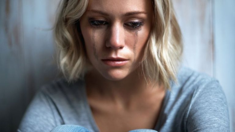 Is Crying Every Day a Sign of Depression hero image of a woman crying.